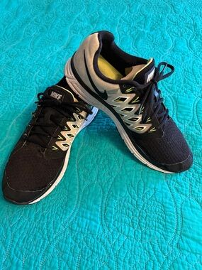 Nike Men’s Black and White Athletic Running Shoes with Yellow Accents